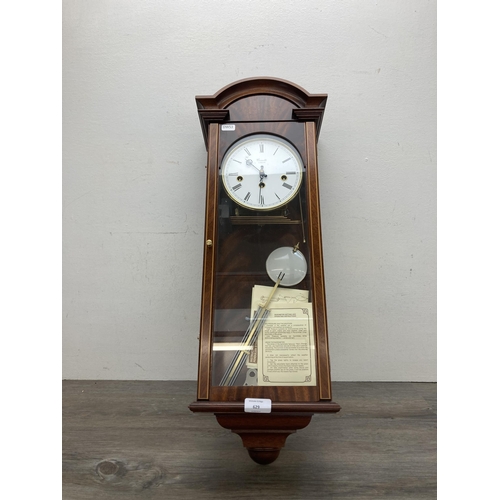 629 - A Comitti of London inlaid mahogany cased Westminster chime wall clock - approx. 70cm high x 22cm wi... 