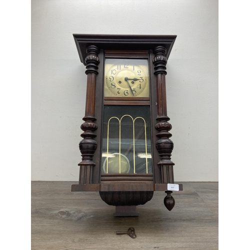 630 - A Victorian mahogany cased chiming wall clock