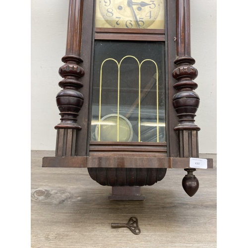 630 - A Victorian mahogany cased chiming wall clock