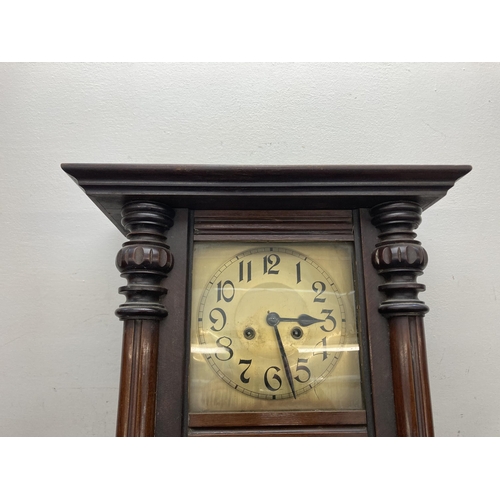 630 - A Victorian mahogany cased chiming wall clock