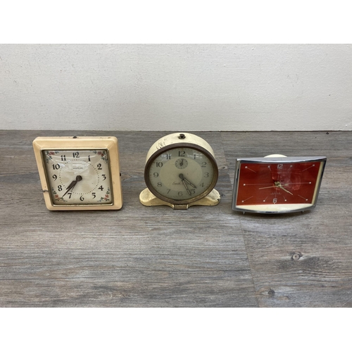 631 - A collection of mid 20th century clocks and barometers to include oak cased Shortland Smiths oak cas... 