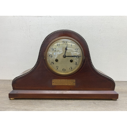 632 - A 1920s inlaid mahogany chiming presentation mantel clock - presented to Mr. Hastbury by the Leek Co... 