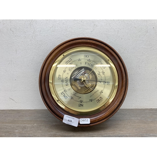 633 - A Garside Williams mahogany and brass aneroid barometer - approx. 23cm diameter