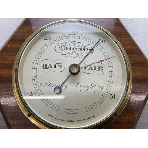 634 - A Short & Mason of London walnut and brass barometer