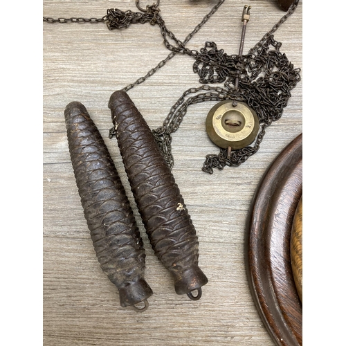 635 - Two items, vintage cuckoo clock with weights and oak cased aneroid barometer