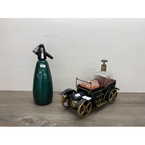 636 - Two mid 20th century items, BOC soda syphon and car shaped decanter and shot glass set