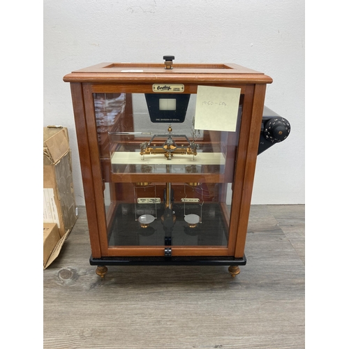 637 - A set of mid 20th century Oertling of London model 147 scientific precision weighing scales - approx... 