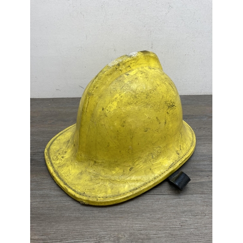 640A - A Cheshire Fire Brigade firefighters helmet, dated 1988