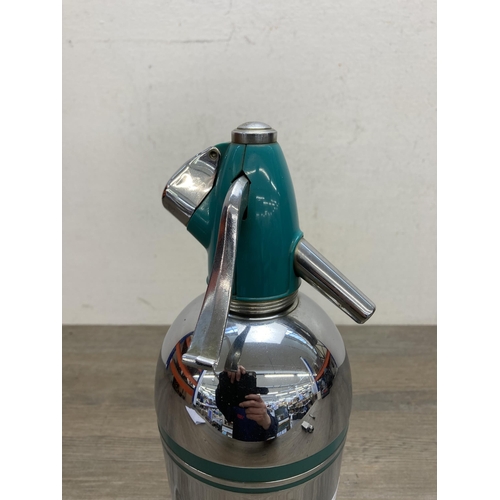 650 - A mid 20th century Sparklets Ltd. turquoise enamel soda syphon on stand