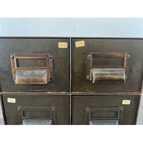 635A - Two 1940s military green metal two drawer index cabinets