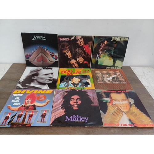 724 - A collection of vinyl records to include Blondie, Chicago, Michael Jackson, John Cougar Mellencamp, ... 