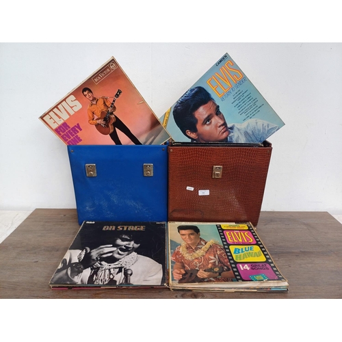 730 - Two record cases containing a large collection of Elvis Presley vinyl records