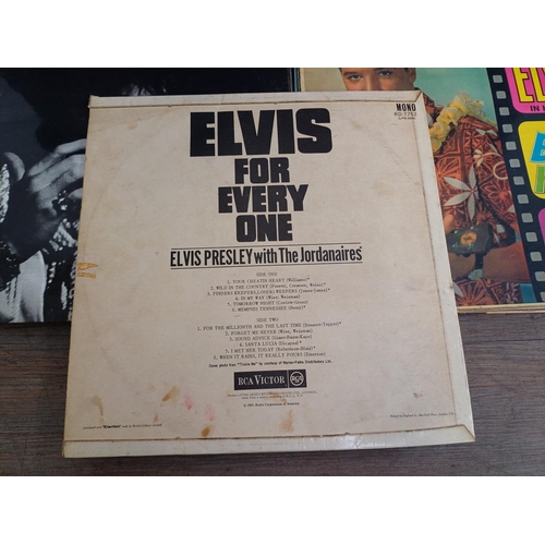 730 - Two record cases containing a large collection of Elvis Presley vinyl records