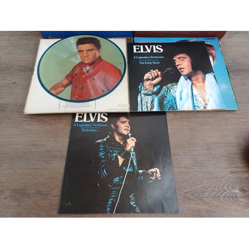 730 - Two record cases containing a large collection of Elvis Presley vinyl records