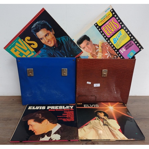 730 - Two record cases containing a large collection of Elvis Presley vinyl records