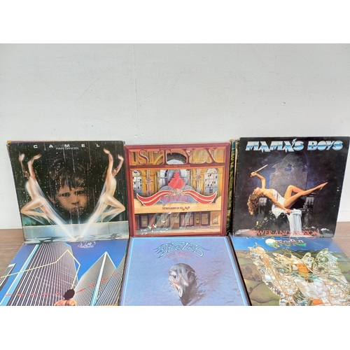 738 - A collection of rock vinyl records to include The Who, Barclay James Harvest, Styx (blue vinyl), Eag... 