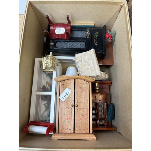 537A - Three boxes containing a collection of doll's house furniture and accessories