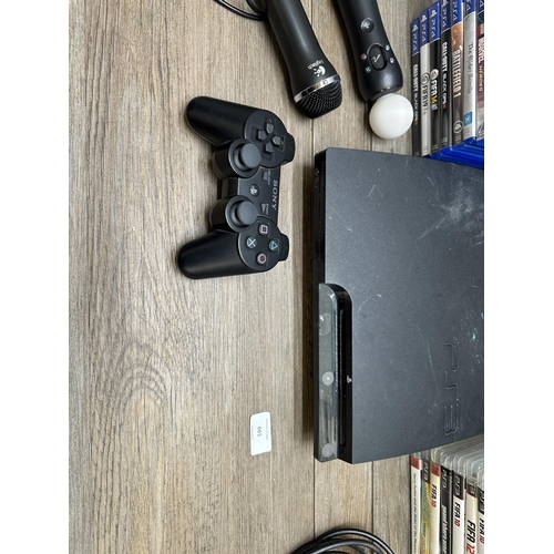 665 - A Sony PlayStation 3 CECH-2503B slim console with DualShock 3 controller, Move Controller and games