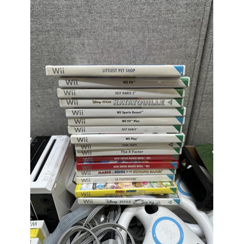 666 - Four Nintendo Wii consoles with controllers, power supplies, games and a large collection of accesso... 