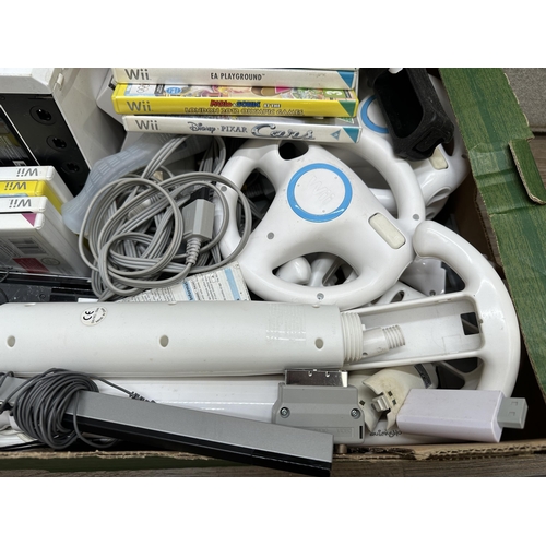 666 - Four Nintendo Wii consoles with controllers, power supplies, games and a large collection of accesso... 