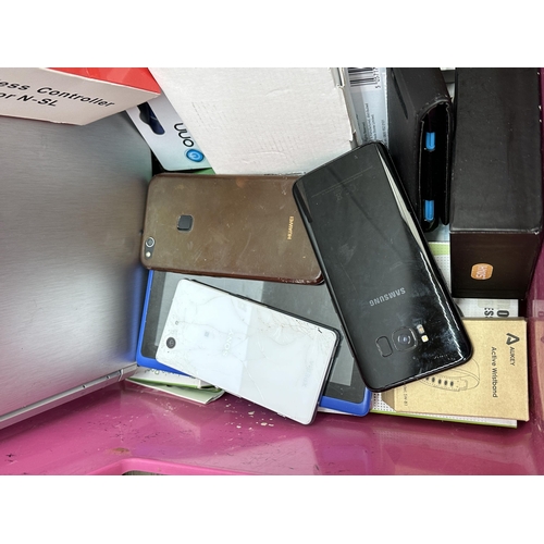 669 - A box containing various technology items to include Acer V3-112P notebook, Apple iPhone A1429, boxe... 