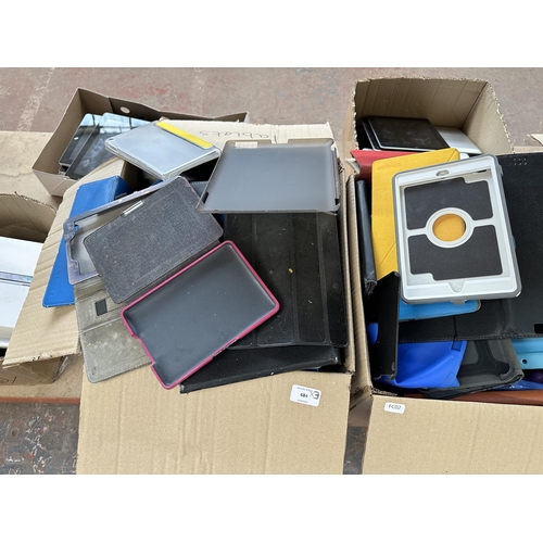 684 - Three boxes containing a large collection of broken tablets and cases to include Apple, Samsung, Kob... 