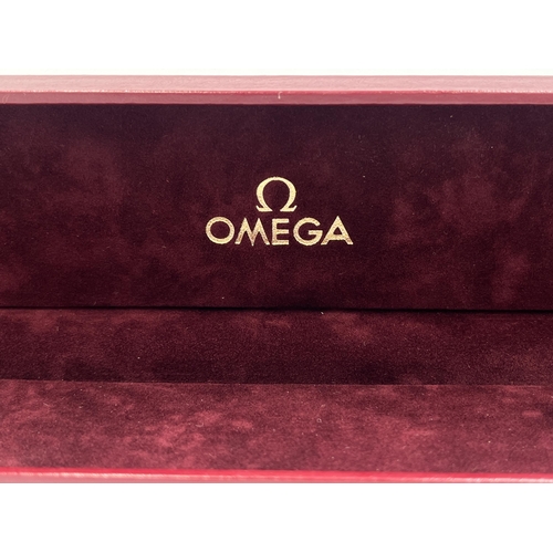 2234 - A mid 20th century Omega empty wristwatch box