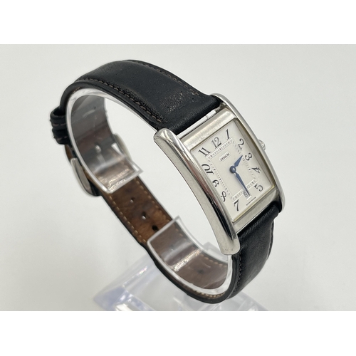 2235 - A boxed Coach W502B stainless steel quartz wristwatch with leather strap, service guide and warranty... 