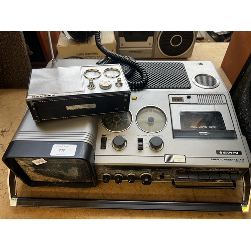 808 - Four items, one Sanyo MT5280 three-band radio/cassette recorder/TV, one Regentone two-band transisto... 