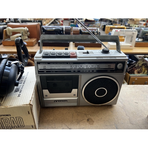 808 - Four items, one Sanyo MT5280 three-band radio/cassette recorder/TV, one Regentone two-band transisto... 