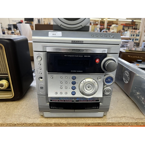 812 - A Samsung MAX-S520 mini stereo system comprising three disc changer CD player, twin cassette, receiv... 