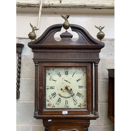 10 - A Georgian carved oak cased grandfather clock with hand painted enamel face, pendulum and weights - ... 