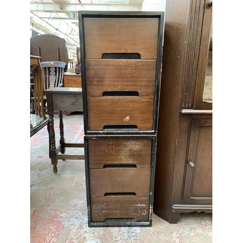 104 - A pair of mid 20th century Stag C Range bedside chests of drawers designed by John & Sylvia Reid - a... 