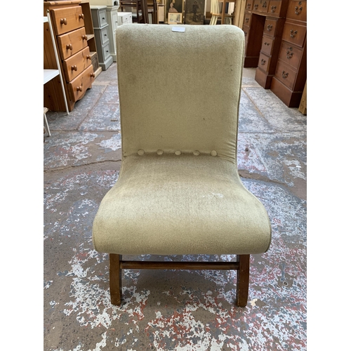 114 - A mid 20th century green fabric upholstered and beech bedroom chair