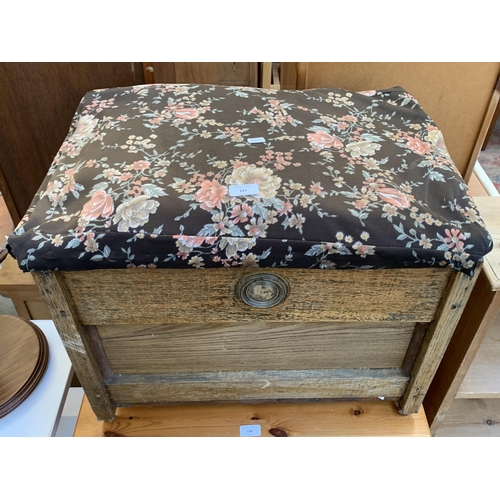 117 - A mid 20th century oak and fabric upholstered blanket box - approx. 50cm high x 63 cm wide x 40cm de... 