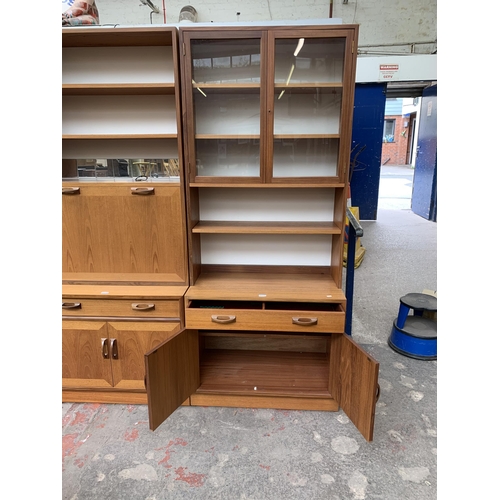 125 - A mid 20th century G Plan teak bookcase/wall unit - approx. 198cm high x 84cm wide x 46cm deep