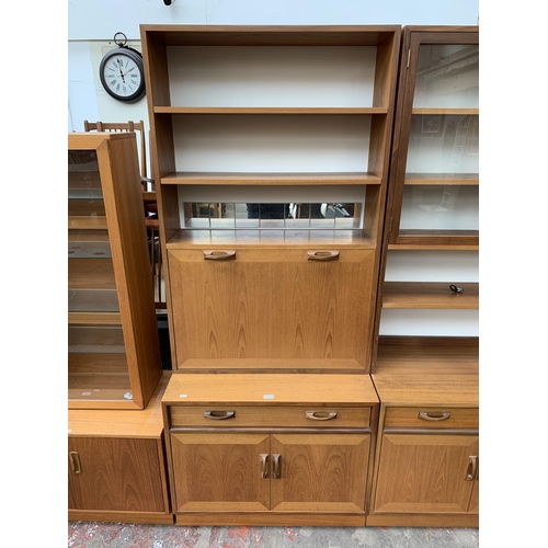 126 - A mid 20th century G Plan teak cocktail cabinet/wall unit - approx. 198cm high x 84cm wide x 46cm de... 