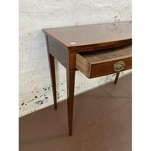 141 - An early 19th century inlaid mahogany bow fronted console table on tapering supports - approx. 75cm ... 