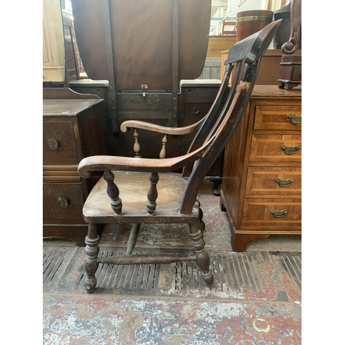 152 - A Victorian elm and beech farmhouse armchair - approx. 102cm high x 62cm wide x 49cm deep