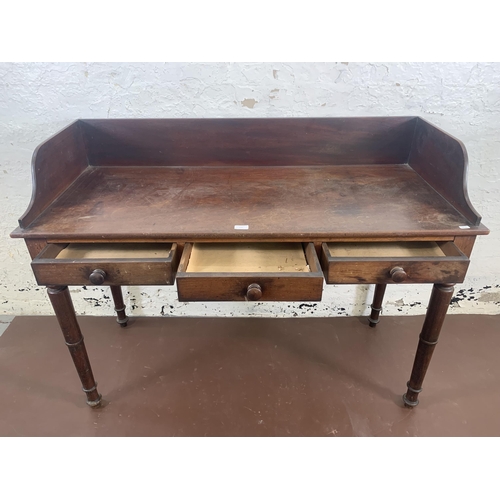 155 - A Victorian mahogany writing table - approx. 94cm high x 127cm wide x 53cm deep
