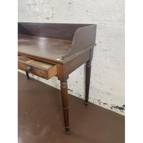 155 - A Victorian mahogany writing table - approx. 94cm high x 127cm wide x 53cm deep