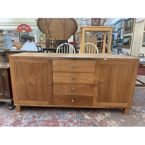 169 - An Indonesian teak sideboard - approx. 79cm high x 158cm wide x 45cm deep