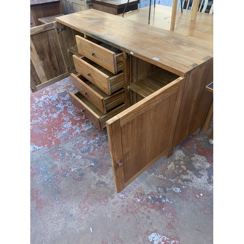 169 - An Indonesian teak sideboard - approx. 79cm high x 158cm wide x 45cm deep