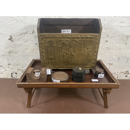 171 - Three items, one embossed brass magazine rack, one oak tray on stand and one box containing a collec... 