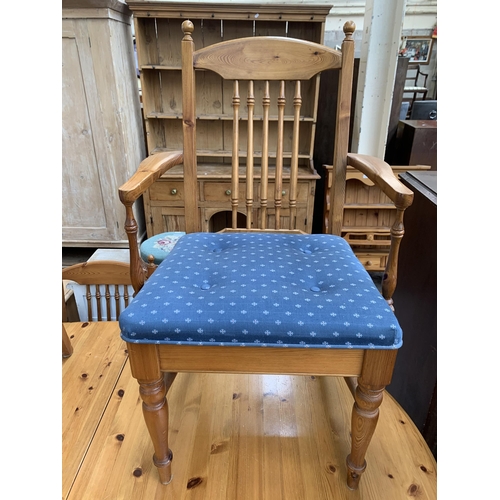 185 - A pine extending dining table and six chairs - approx. 76cm high x 110cm wide x 167cm long