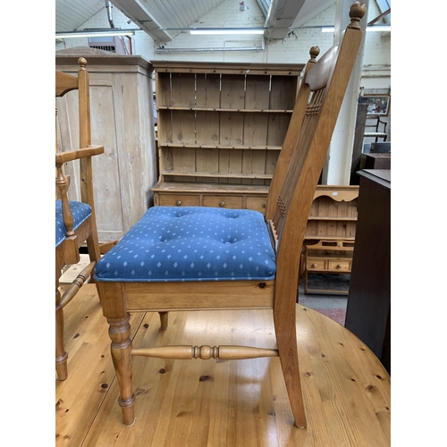 185 - A pine extending dining table and six chairs - approx. 76cm high x 110cm wide x 167cm long