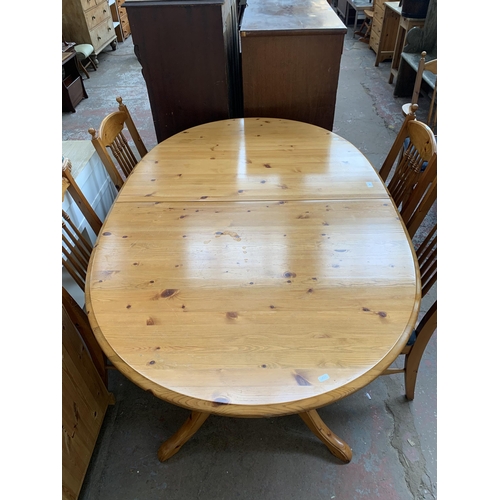 185 - A pine extending dining table and six chairs - approx. 76cm high x 110cm wide x 167cm long