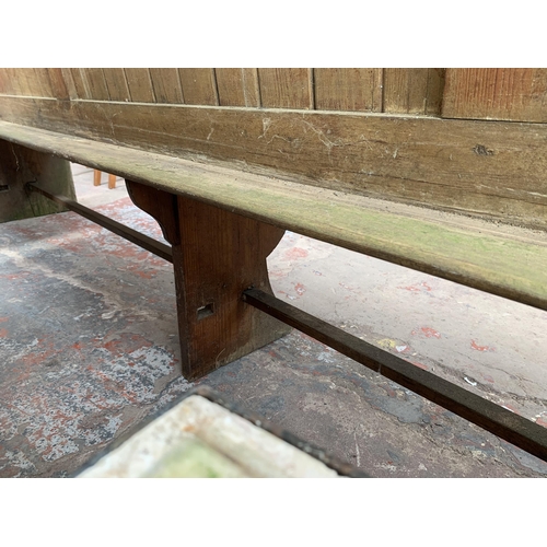 191 - A Victorian pitch pine church pew - approx. 101cm high x 308cm wide x 40cm deep