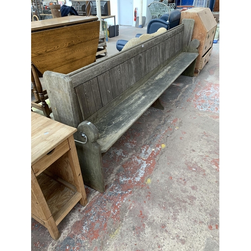 191 - A Victorian pitch pine church pew - approx. 101cm high x 308cm wide x 40cm deep