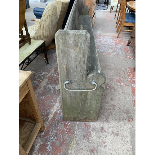 191 - A Victorian pitch pine church pew - approx. 101cm high x 308cm wide x 40cm deep